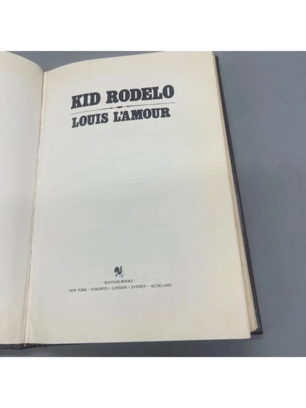 Kid Rodelo By Louis LAmour Brown Leather Hardcover 1986 Bantam Edition READ